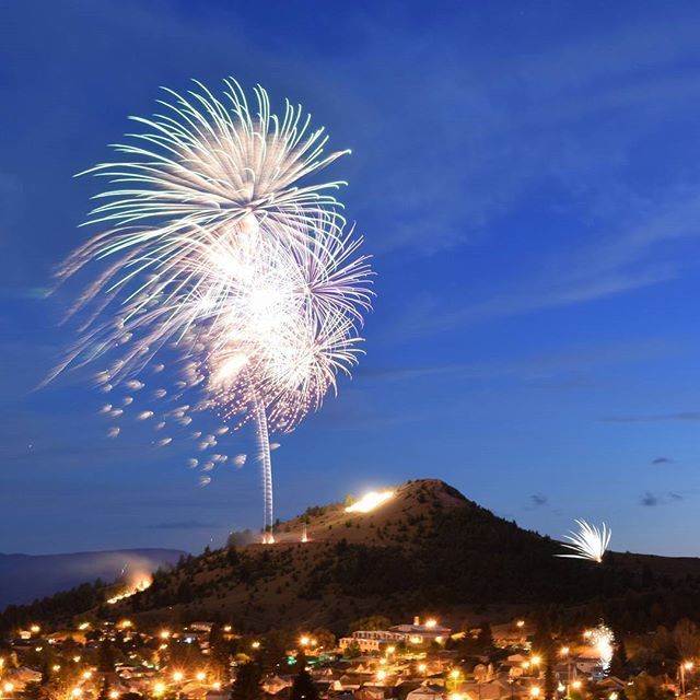 Brendon Powers Fireworks exploding in the night sky over  Butte, MT