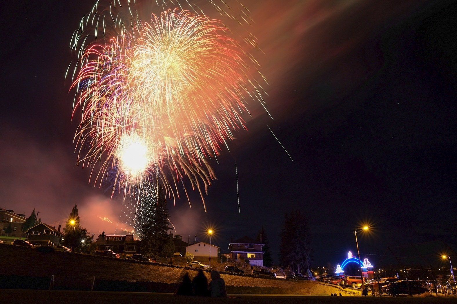 Riley Vetter Fireworks exploding in the night sky over  Butte, MT