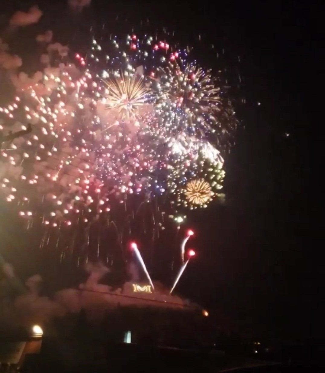 Fireworks exploding in the night sky over  Butte, MT