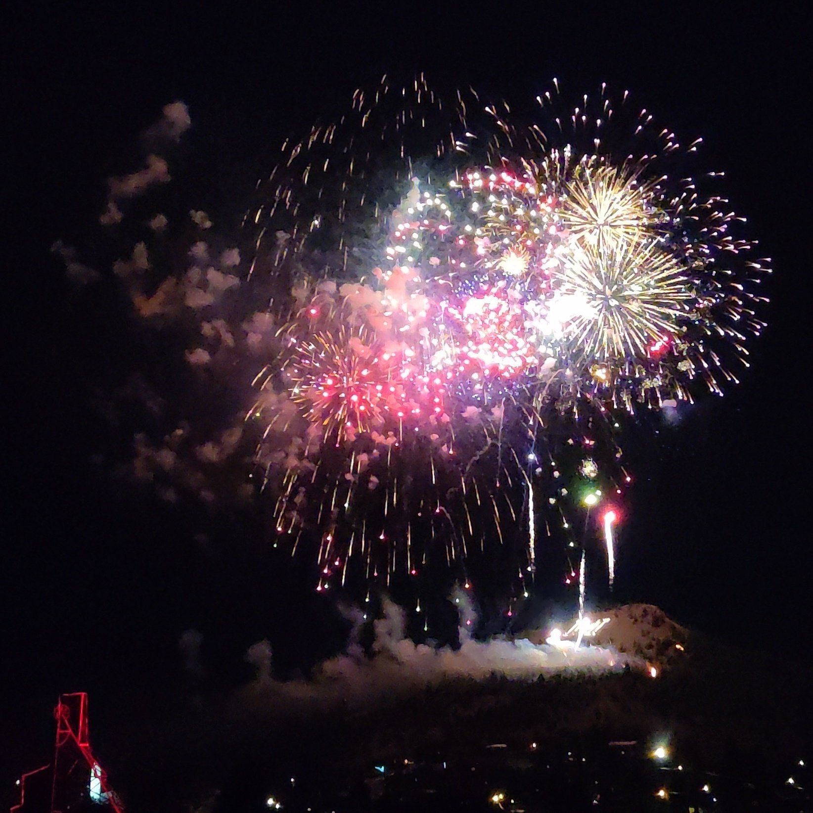 Fireworks exploding in the night sky over  Butte, MT