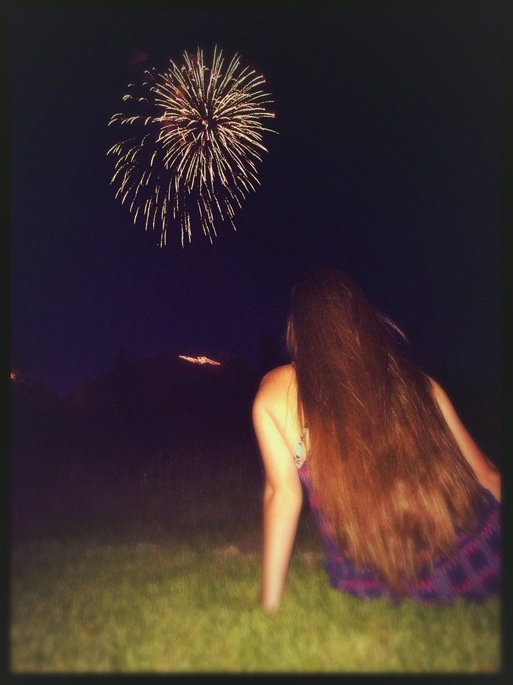 Erin Fogarty Fireworks exploding in the night sky over  Butte, MT