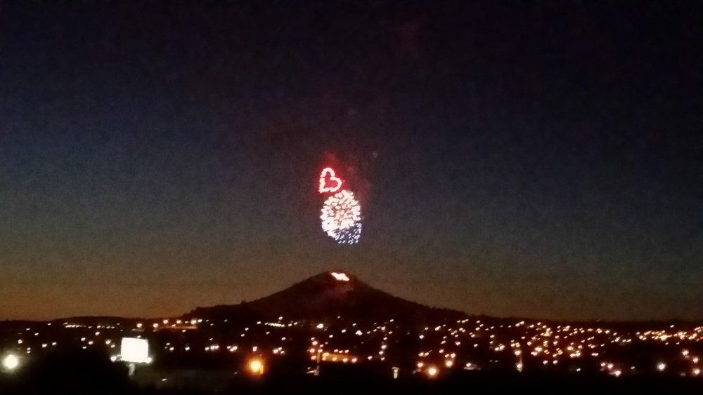 Nikki Powers Fireworks exploding in the night sky over  Butte, MT
