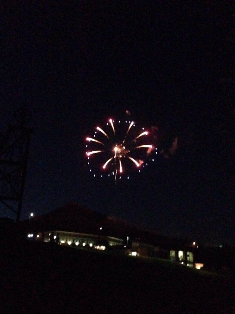 Cathy M Fireworks exploding in the night sky over  Butte, MT