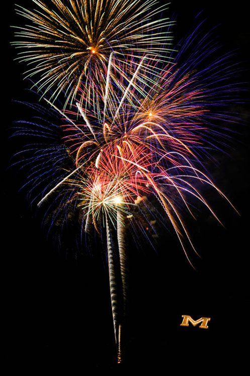 Angela Vidrich Fireworks exploding in the night sky over  Butte, MT