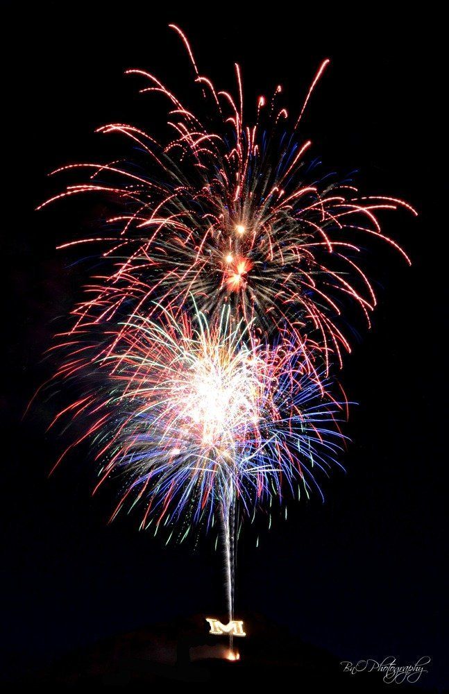 Brianna O'Mara Fireworks exploding in the night sky over  Butte, MT