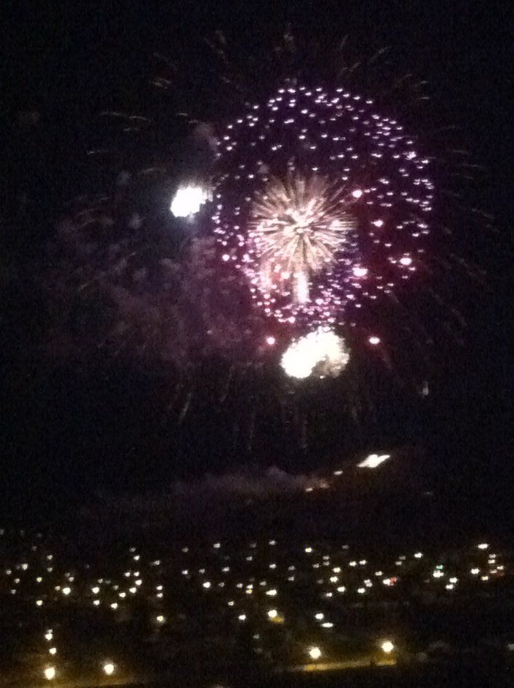 Zach maunder Fireworks exploding in the night sky over  Butte, MT