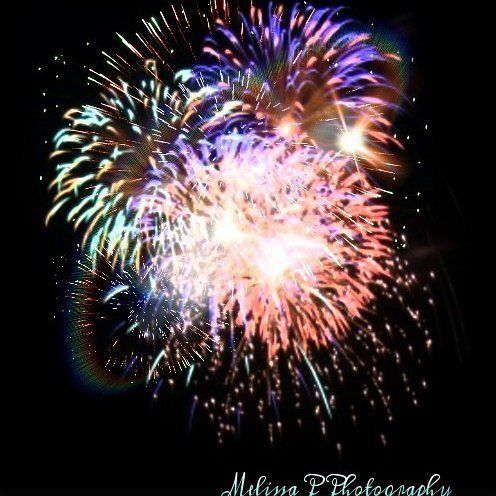 Melissa Pettersen Fireworks exploding in the night sky over  Butte, MT