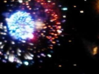 Arlene Pettersen Fireworks exploding in the night sky over  Butte, MT