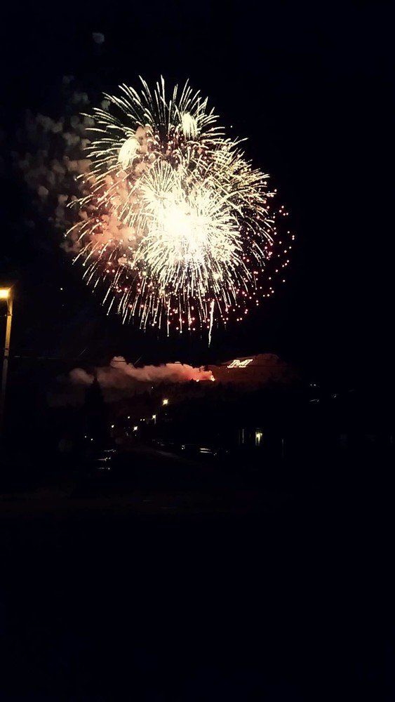 Katelyn Kotka Fireworks exploding in the night sky over  Butte, MT