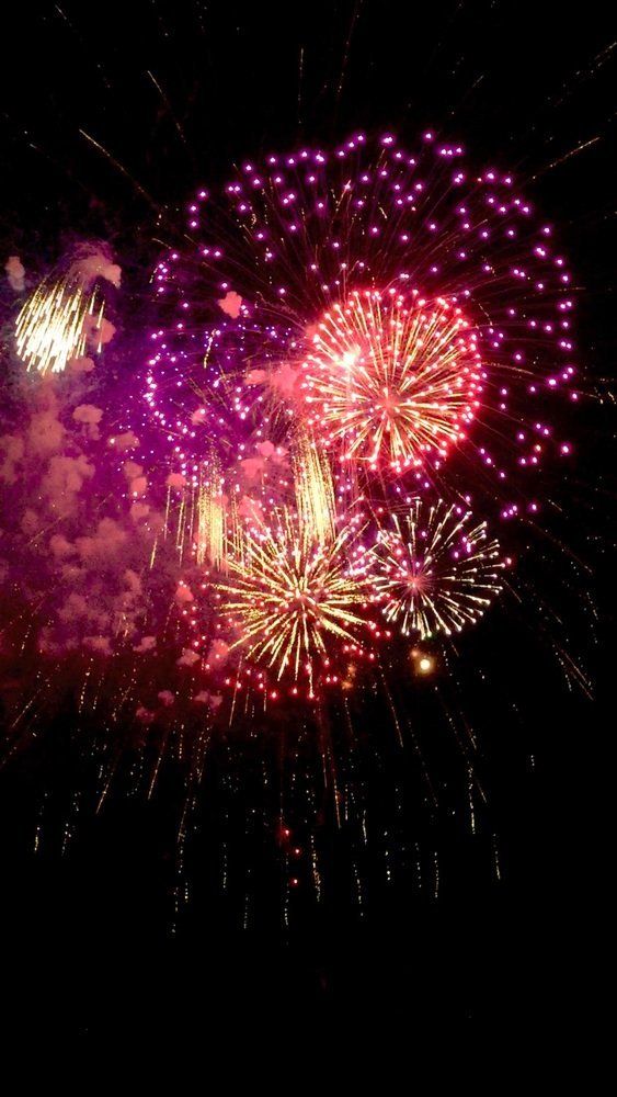 Brian Carr Fireworks exploding in the night sky over  Butte, MT