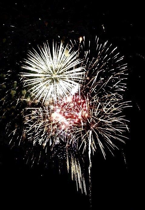 Victoria Bernhardt Fireworks exploding in the night sky over  Butte, MT