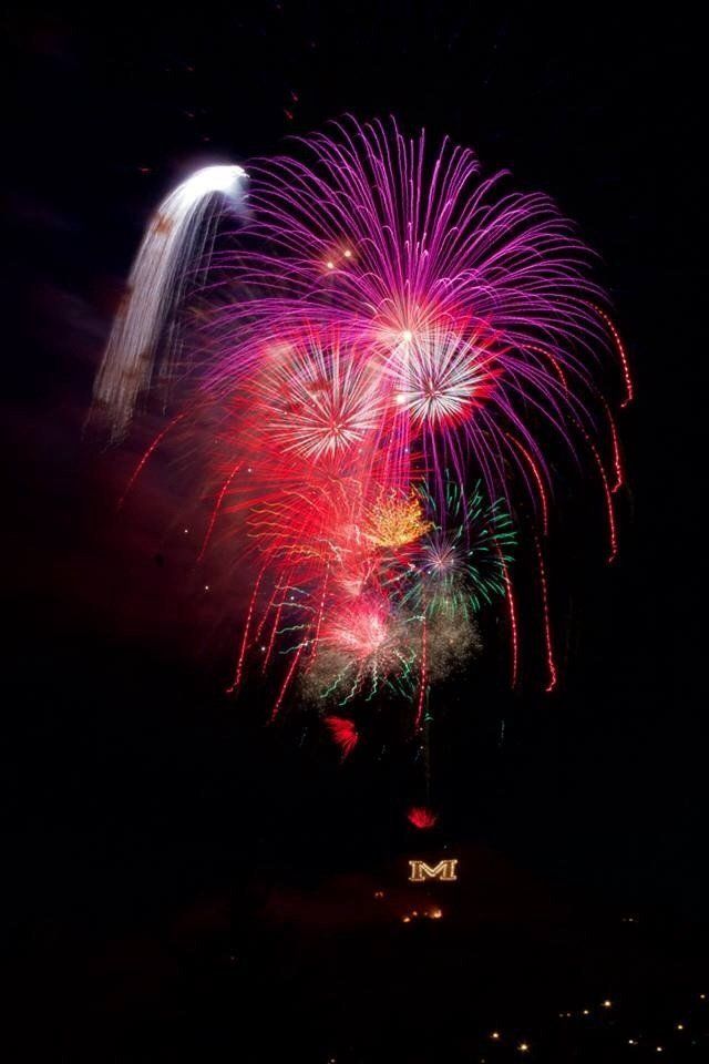 Connie Cutler Fireworks exploding in the night sky over  Butte, MT