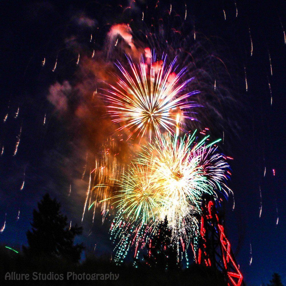 LeeAnna Teston Fireworks exploding in the night sky over  Butte, MT