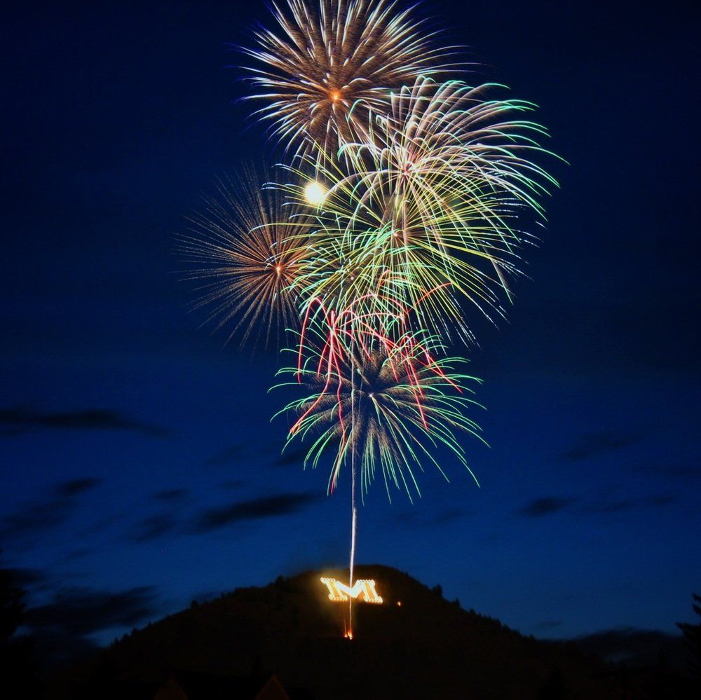Jason Hoff Fireworks exploding in the night sky over  Butte, MT