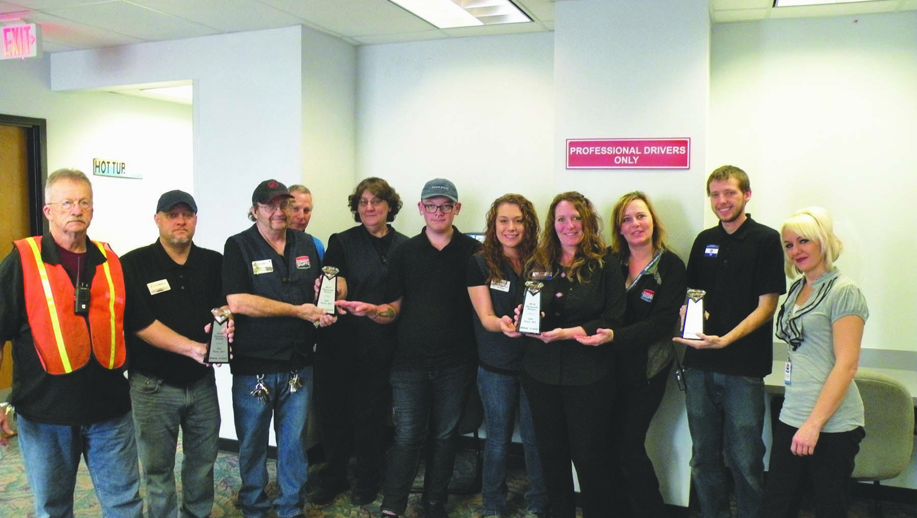 Staff photo of Rocker Flying J with Diamond Dealer award