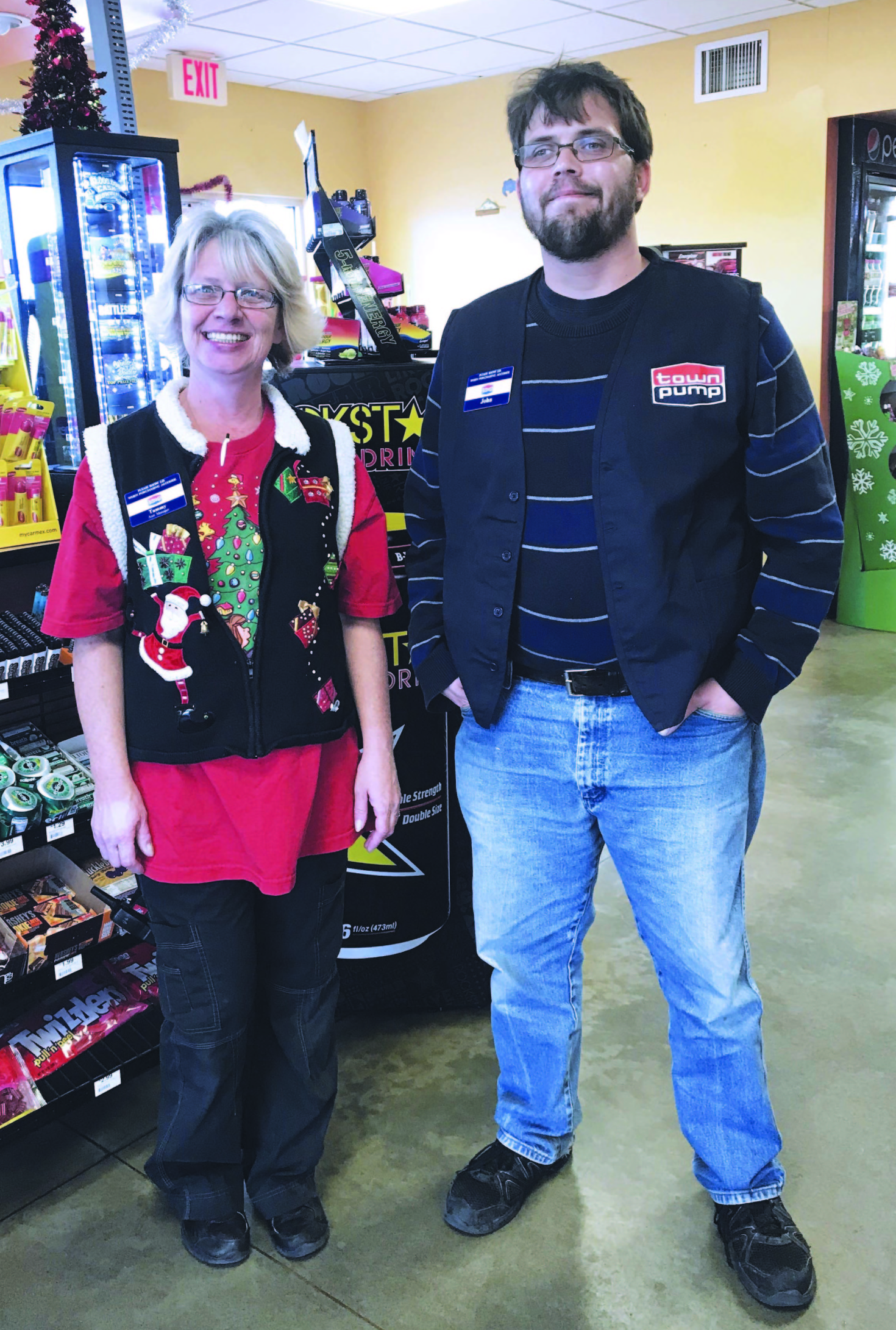Laurel 1 C-Store employees pose in Christmas sweaters
