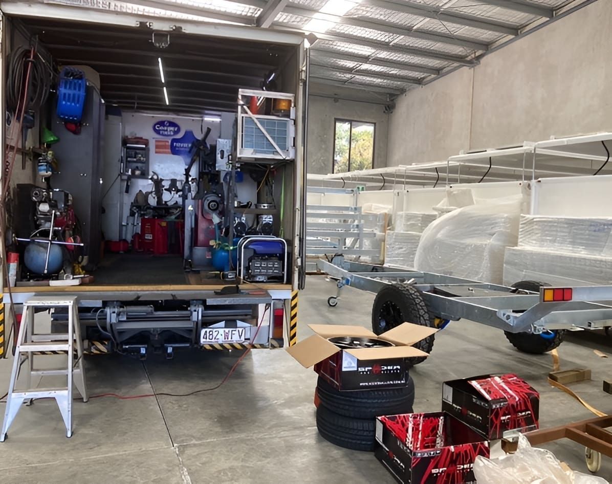 A Truck Is Parked In A Garage — Docs Mobile Tyre Service in Bli Bli, QLD