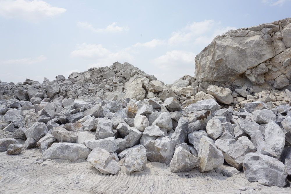 A Pile Of Rocks In A Quarry With A Blue Sky In The Background — Ballina Demolitions In Alstonville, NSW