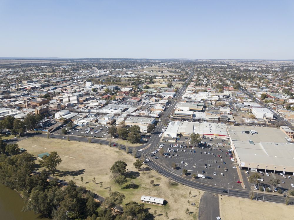 An Aerial View Of A City With A Lake In The Middle Of It — Ballina Demolitions In Goonellabah, NSW