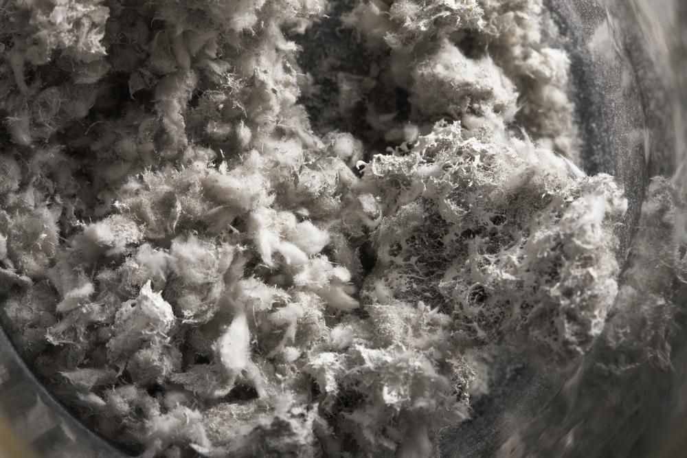 A Close up Of a Pile of Dust in A Bowl — Ballina Demolitions In East Wardell, NSW