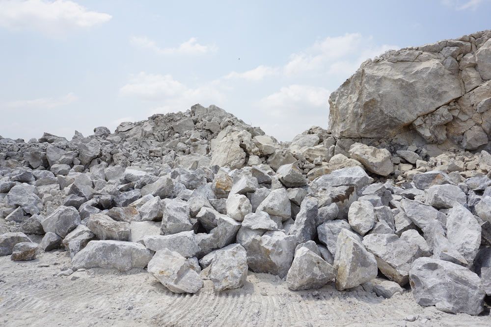 A Pile Of Rocks In A Quarry With A Blue Sky In The Background — Ballina Demolitions In Ballina, NSW