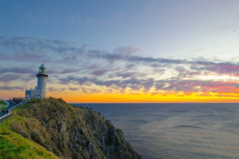A Lighthouse On Top Of A Cliff Overlooking The Ocean — Ballina Demolitions In Byron Bay, NSW