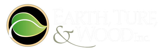 A logo with a green leaf in a circle on a white background.