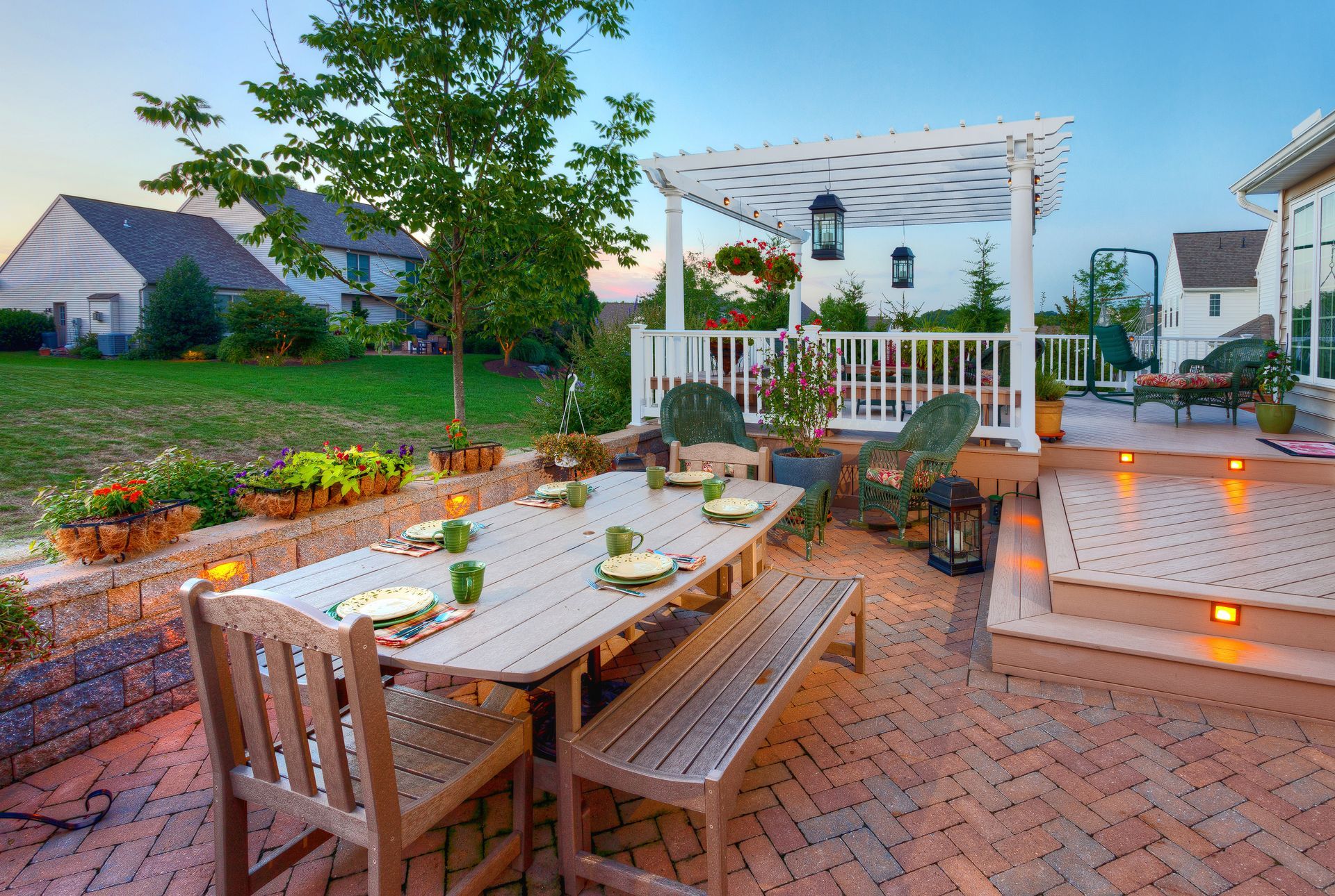 A patio with a table and chairs and a pergola