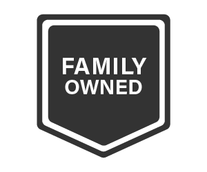 Black and white shield-shaped badge with text