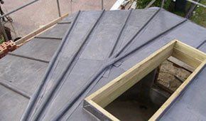 A skylight window being fitted