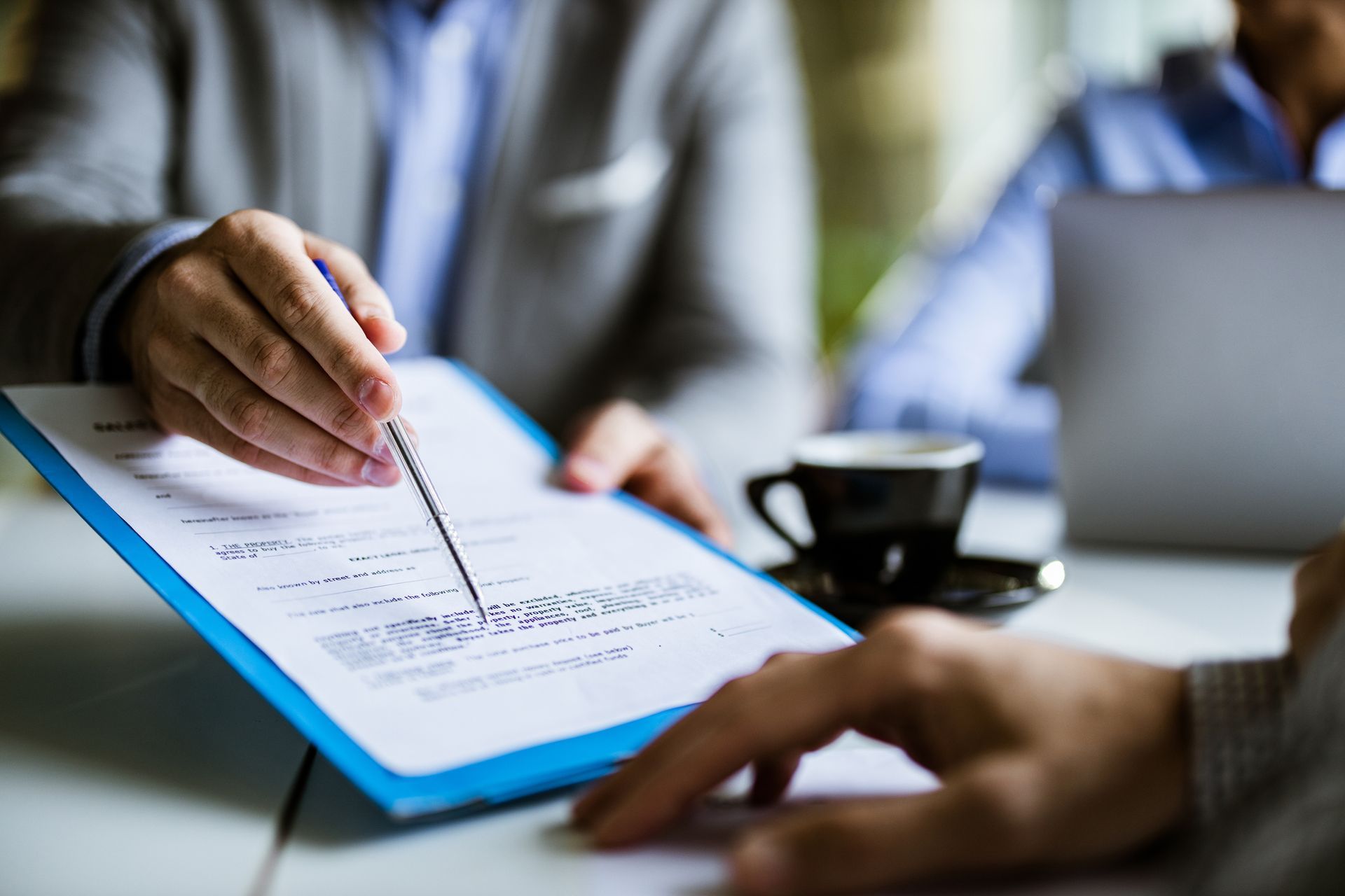 Typing on Laptop – Stockton, CA – Orlando Investigation Services
