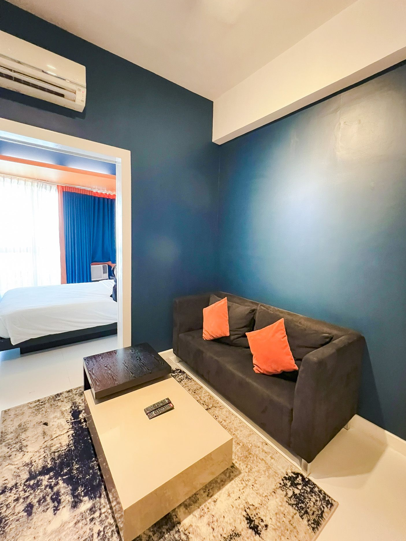 Stylish Makati hotel room with vibrant decor, perfect for a weekend staycation with easy access to meeting rooms.