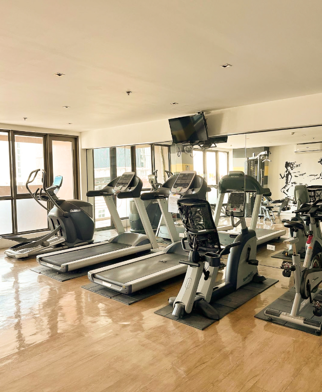 The fully-equipped gym at KL Serviced Residences, allowing guests to maintain their fitness routine while staying in Makati.