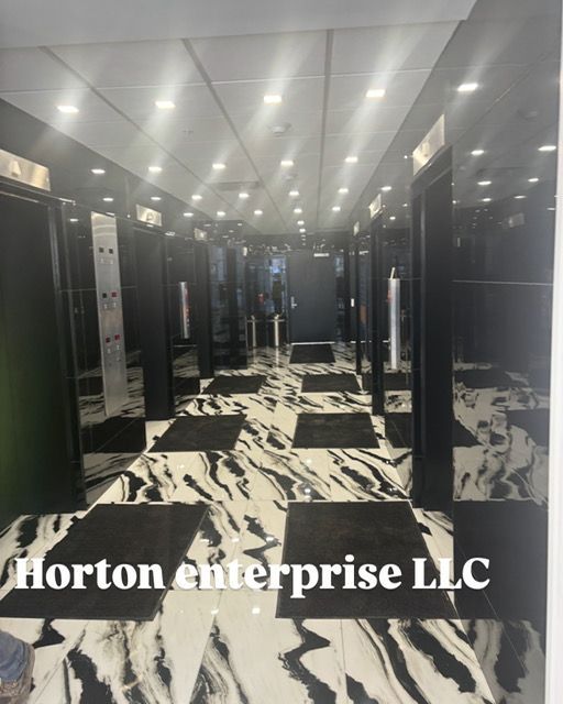 A picture of a hallway with the words horton enterprise llc on the bottom