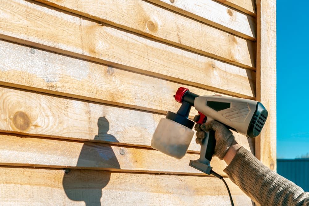 Spraying Wood Antiseptic — Brazel's Pest Control in Dorrigo, NSW