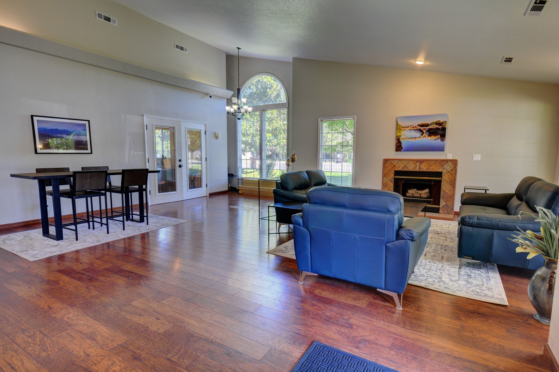 A living room filled with furniture and a fireplace.