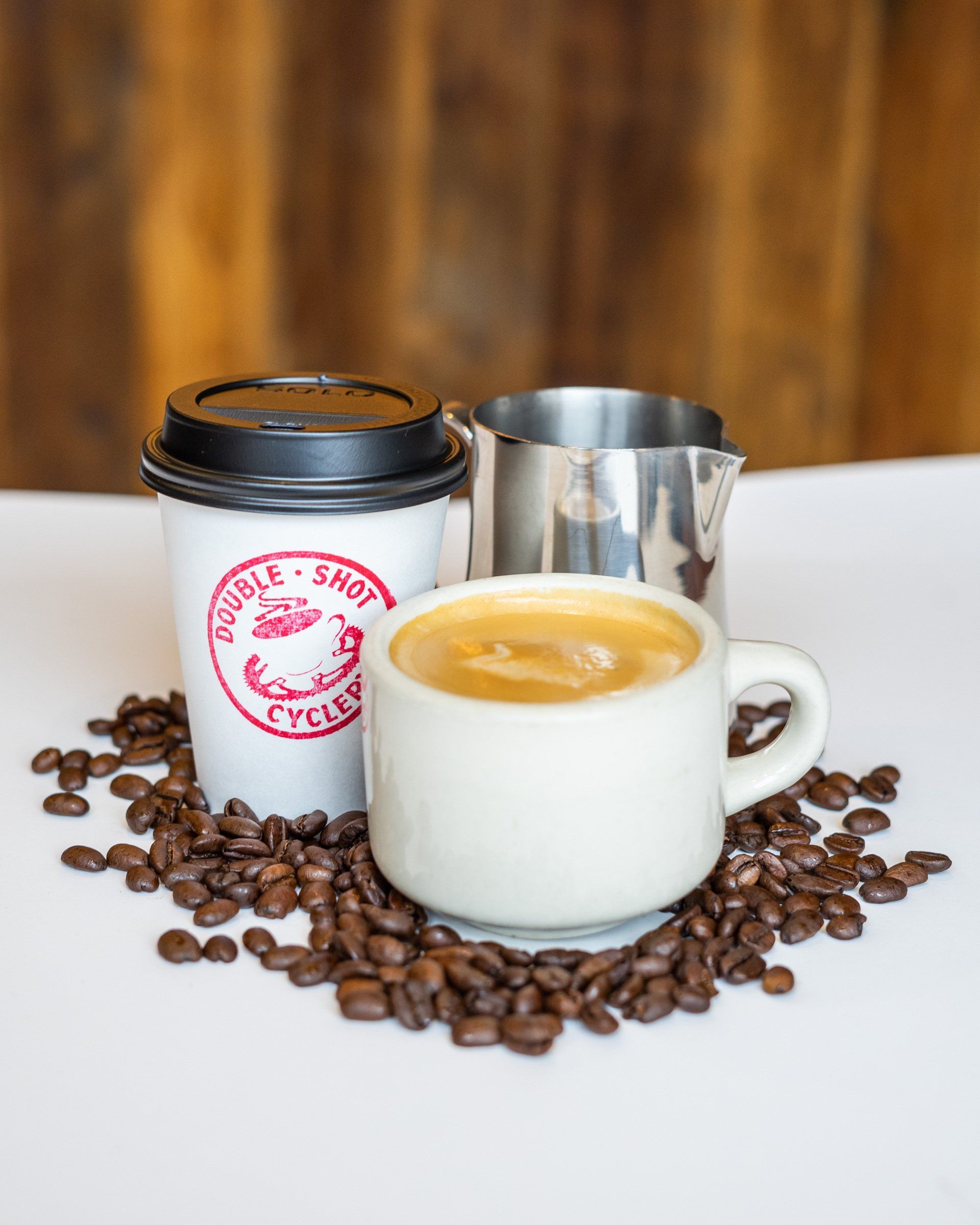 Barista making coffee with design in foam