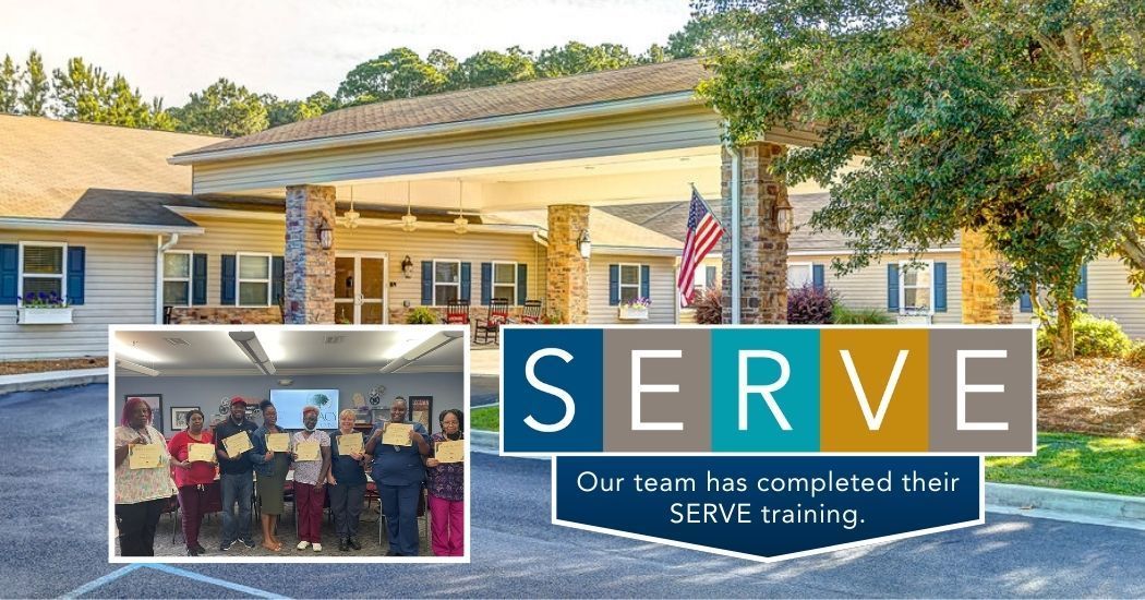 A group of people standing in front of a building with a sign that says serve.