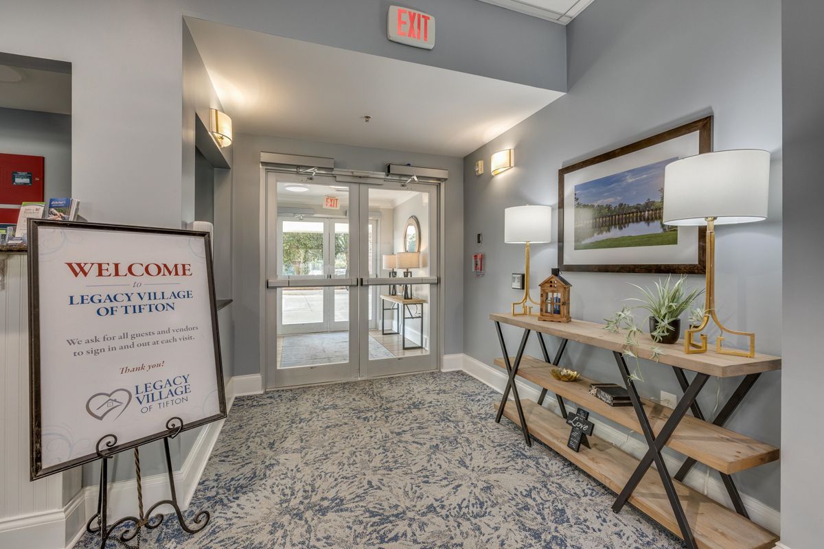 A hallway with a welcome sign in the middle of it.