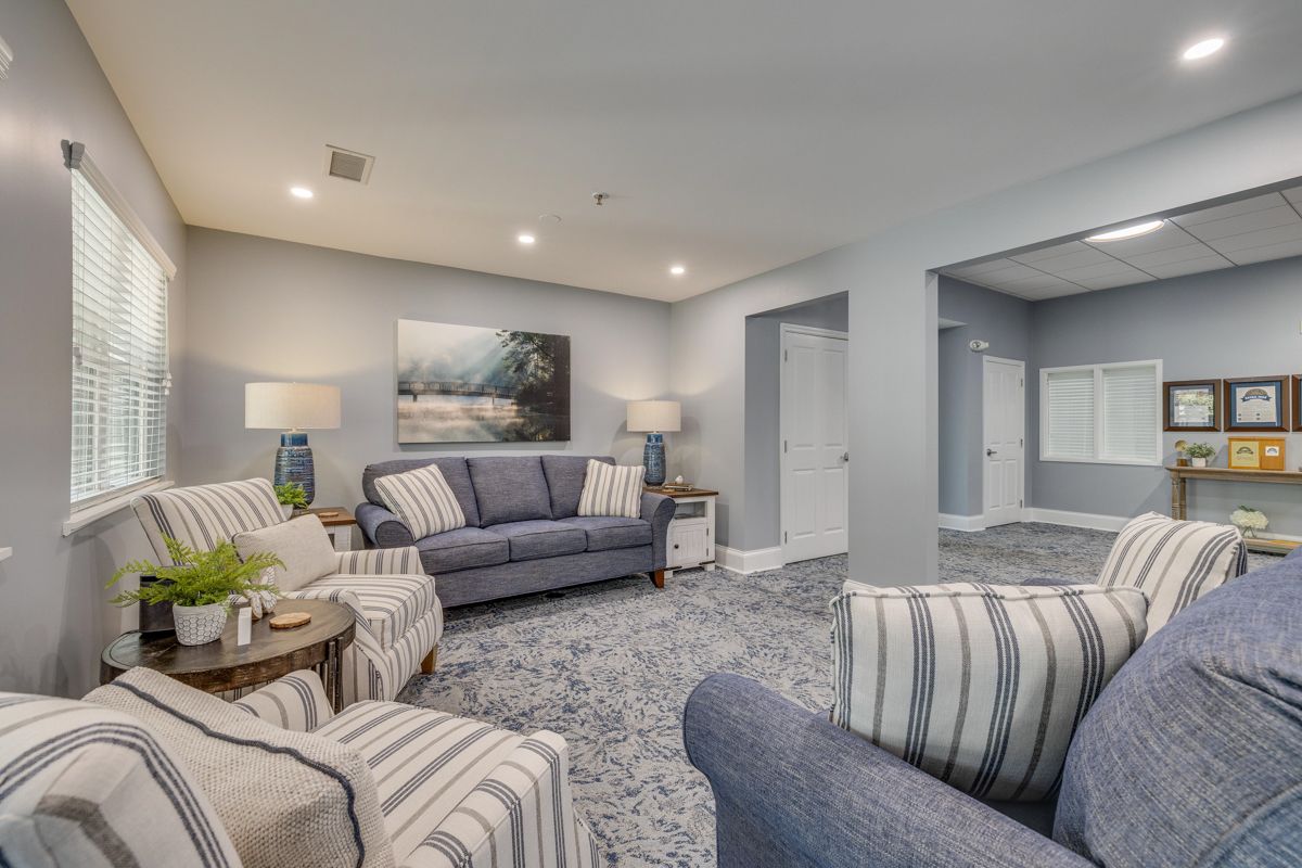 A living room filled with furniture and a couch.