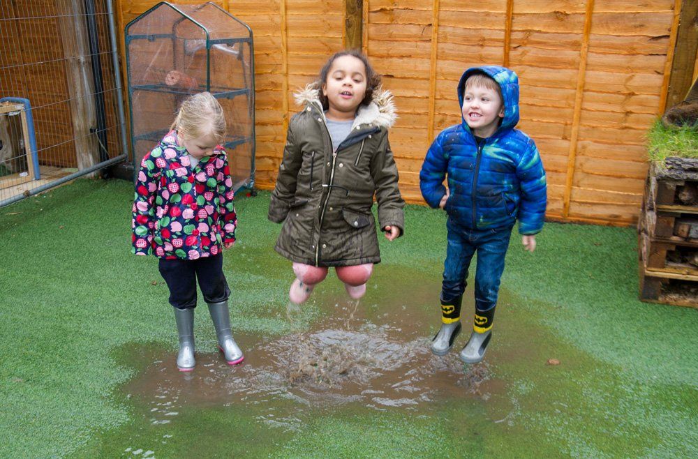 kids playing in the water outdoors