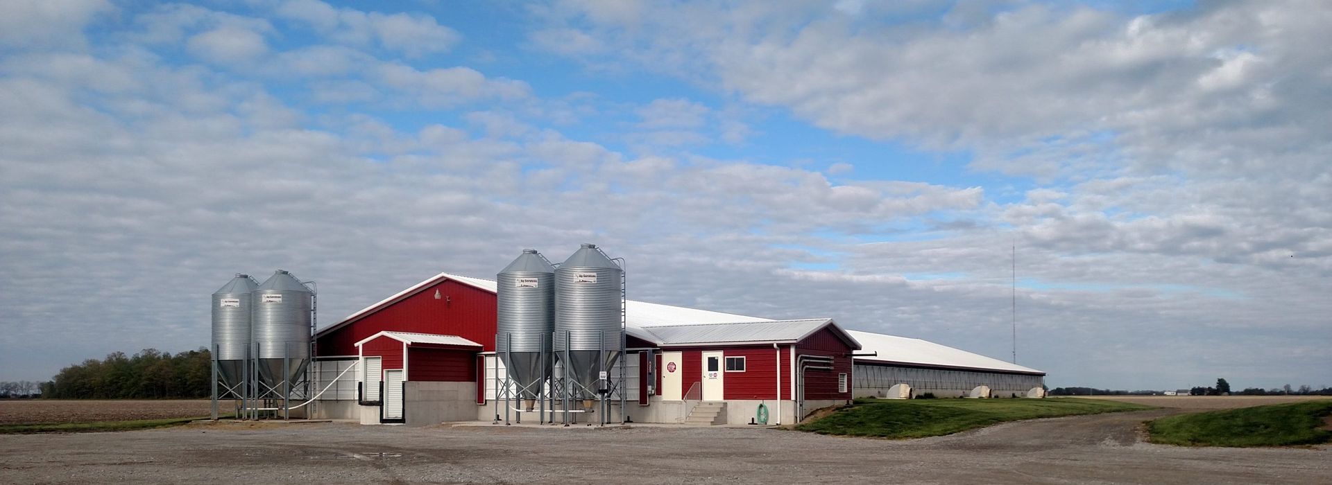 A city skyline with a brick chimney that says j.r. tower