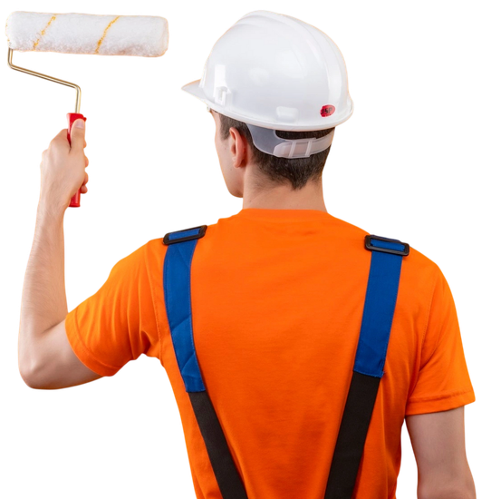 Painter in orange shirt and white hard hat rolling white paint on a wall with a paint roller