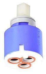 A close up of a faucet cartridge on a white background.