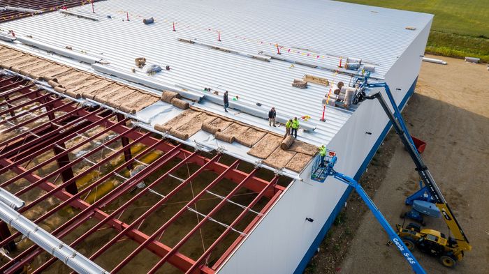 Installing roof on a warehouse