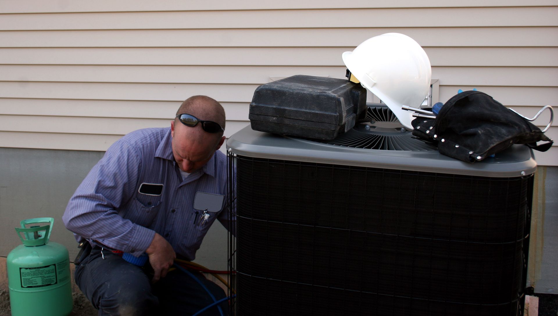 Worker Repairing - Evansville, IN - TRM Heating and Cooling