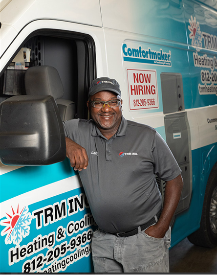 A person leaning against a van. A person leaning against a van.