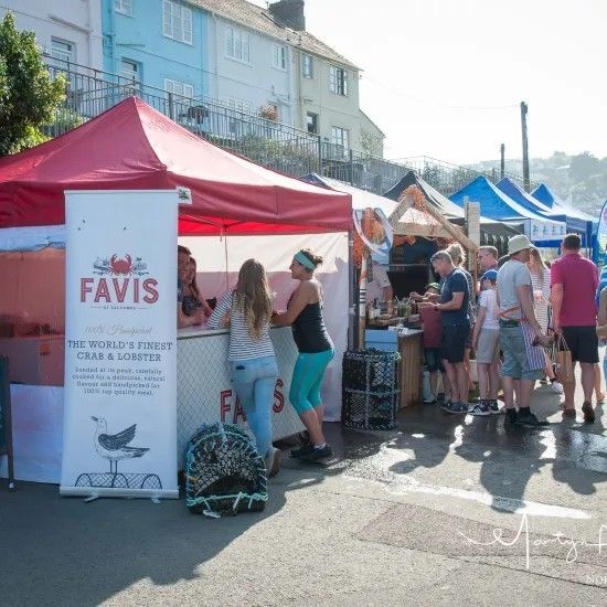 Outdoor food market, red tent with 