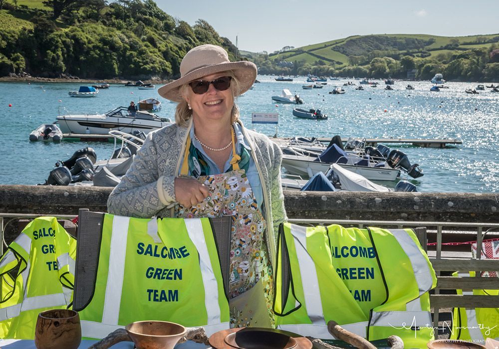 Woman smiling at a table with 