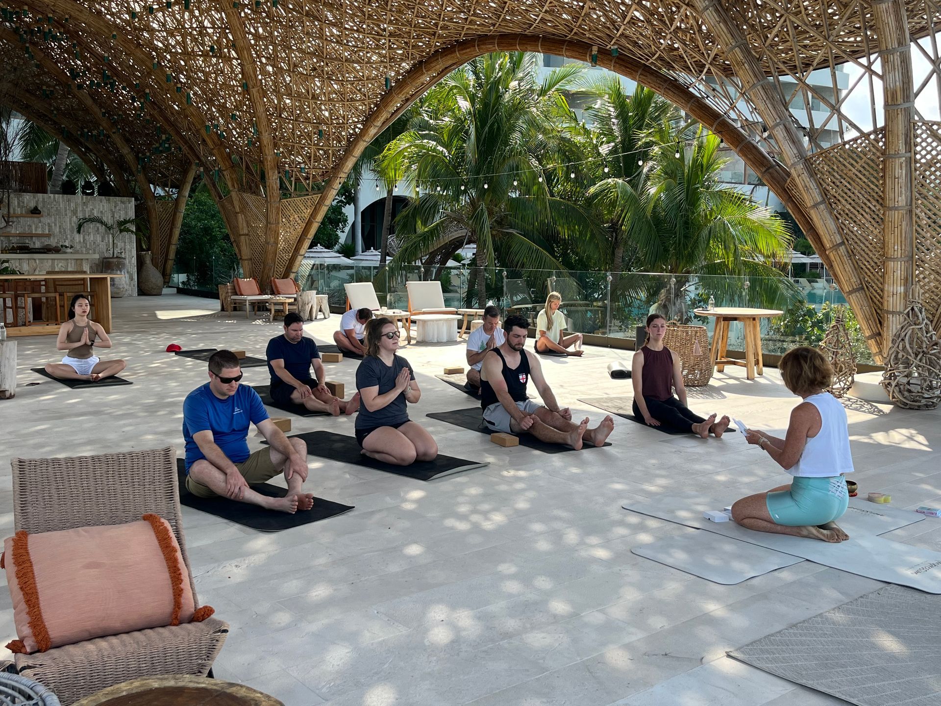 group meditating outside